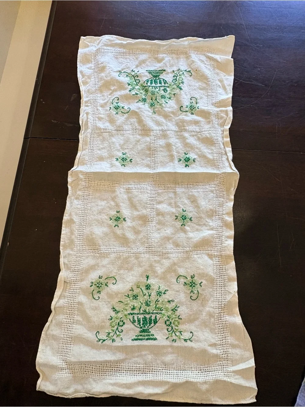 Embroidered Linen Table Runner with Green Floral Urn Design